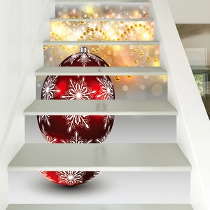 Detailed view of 3D Christmas stair stickers with red festive baubles and snowflakes