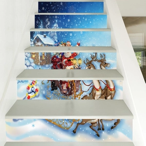 Macro view of Christmas staircase stickers with Santa and reindeer on white steps