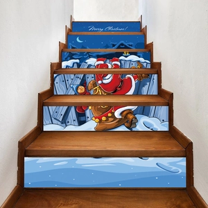 Detail of Christmas staircase decals showing Santa Claus cartoon in a snowy winter scene
