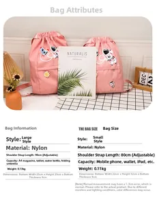 Size comparison detail of pink nylon drawstring backpacks with astronaut embroidery