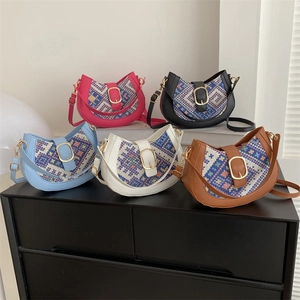 Ethnic style woven half-moon crossbody bags with gold buckles in five diverse colors