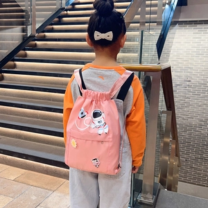 Pink drawstring nylon backpack for kids with embroidered astronaut and sun patterns