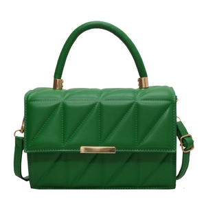 Elegant green quilted square crossbody bag with gold hardware and top handle for women