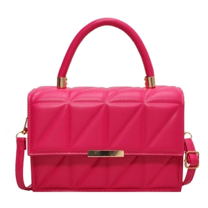 Quilted geometric magenta flap bag with gold hardware and top handle for women