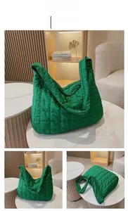 Close-up of quilted green space cotton tote bag with fluffy puffer texture and wide straps