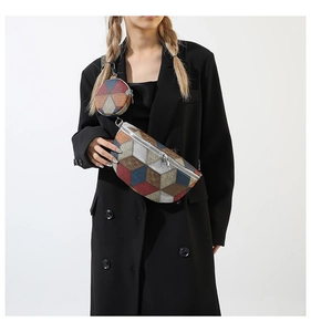 Detail view of colorful geometric patchwork waist bag with round matching coin purse