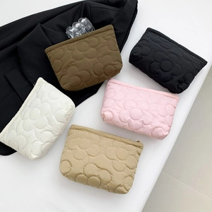 Quilted floral handbag collection in five colors with a soft padded texture for women