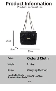 Detail view of black quilted shoulder bag dimensions 25x21x8cm with gold chain