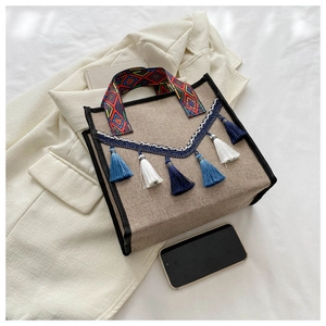 Sac seau ethnique en lin avec anses brodées colorées et franges de glands bleus