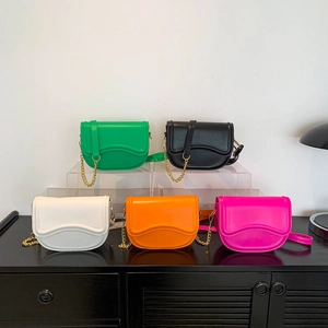 Chic saddle crossbody bags for women in five vibrant colors with gold chain straps