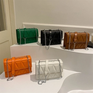 Set of quilted crossbody bags in green, black, brown, orange and white with chain strap