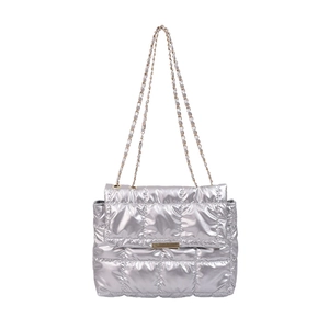 Quilted silver metallic shoulder bag with gold chain strap and square turn-lock closure