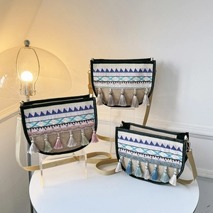 Ethnic style crossbody bag with geometric embroidery and tassels in three color schemes