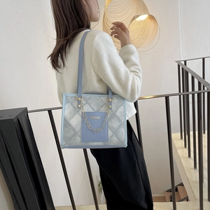 Chic light blue quilted tote bag with golden chain and large capacity for women
