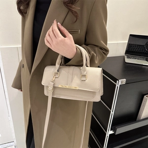 Chic beige lychee pattern handbag with gold hardware and shoulder strap for women
