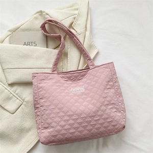 Pink quilted tote bag with diamond pattern and Fashion patch for daily commuting