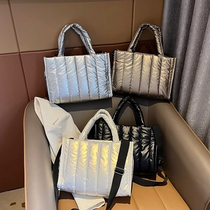 Puffy quilted crossbody bags in metallic silver, gold, white, and black colors