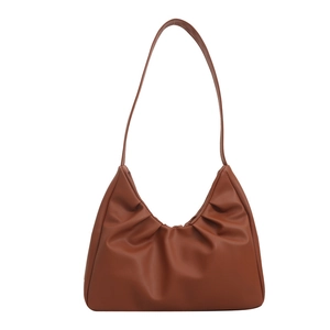 Minimalist caramel crescent shoulder bag with pleated faux leather design for daily commute