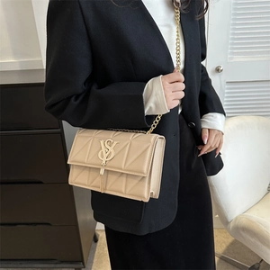 Beige quilted leather crossbody bag with gold hardware and chain strap for women