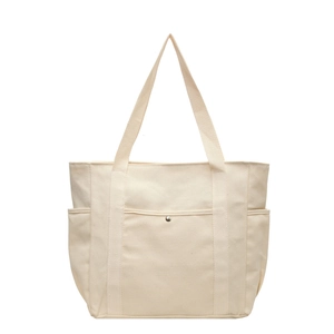 Grand sac fourre-tout en toile beige avec poches latérales et bouton argenté