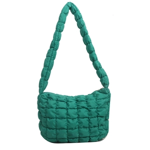 Emerald green quilted puffer shoulder bag made of lightweight padded bubble nylon fabric