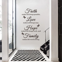 Detail of black vinyl wall stickers with inspirational quotes and butterfly motifs for stairs