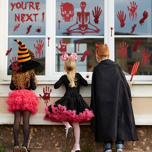 Halloween bloody skull and handprint window stickers with YOU'RE NEXT warning text