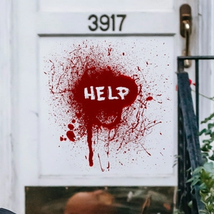 Spooky red blood splatter wall decal with HELP text on a white door for Halloween decor