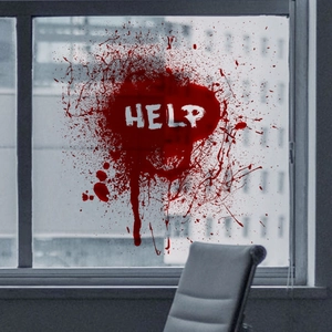 Detail of red blood splatter window decal with HELP text for Halloween window decor