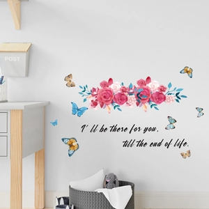 Detail of pink floral wall stickers with butterflies and I'll be there for you quote