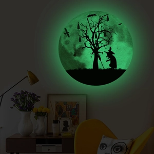 Luminous Halloween wall sticker showing a glowing moon with witch and castle silhouette