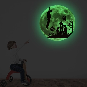 Glow-in-the-dark moon wall decal with witch castle and ghosts for Halloween decor