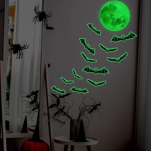 Luminous Halloween wall stickers featuring a large glowing moon and flying bat silhouettes