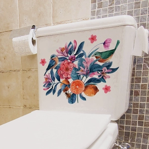 Detail of floral bird sticker with colorful flowers and bees on white toilet tank