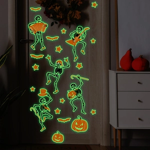 Luminous Halloween wall stickers featuring dancing skeletons and bats glowing in the dark