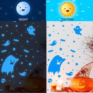 Blue glow-in-the-dark Halloween wall decals featuring ghosts and bats in day and night views