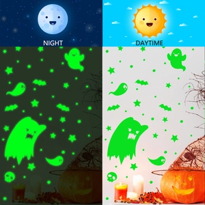Day and night comparison of glowing green Halloween stickers with ghosts and bats