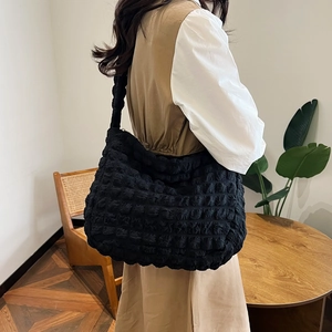 Classic black bubble texture pleated shoulder bag with a spacious cloud-style design