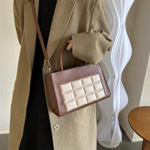 Minimalist winter 2025 brown and beige quilted crossbody bag with dual top handles
