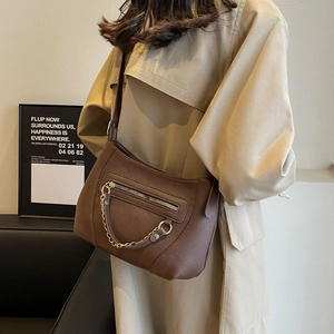 Dark brown pebbled leather shoulder bag with gold chain and front zipper detail