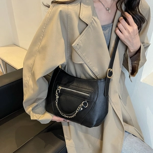 Elegant black lychee textured leather crescent saddle bag with gold chain strap for women