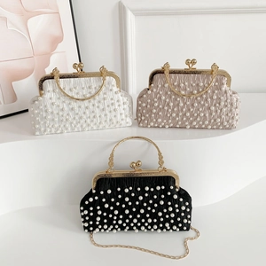 Pleated satin evening clutch bags with pearl beads and gold kiss lock in black and white