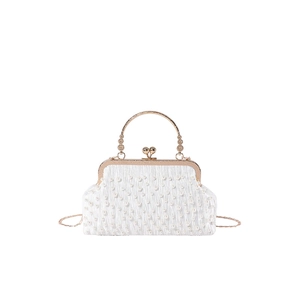 White satin shell-shaped evening clutch bag with pearl embellishments and gold chain strap