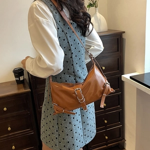 Brown vintage leather shoulder bag with metallic buckle detail for women