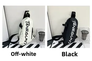 Detail shot of off-white and black nylon crossbody bags with TENRGUN lettering