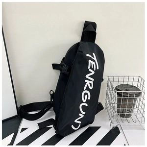 Detail view of black nylon sports chest bag featuring adjustable strap and white brand logo