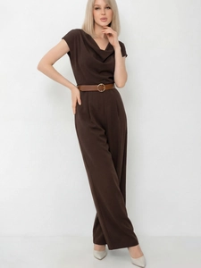Detail of elegant dark brown satin jumpsuit with cowl neck and gold buckle belt