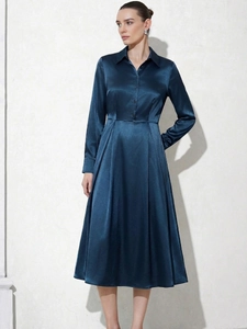 Elegant navy blue satin long-sleeve midi dress with shirt collar and waist-cinching detail