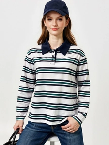 Détail du col marine et de la patte de boutonnage sur un polo classique à manches longues