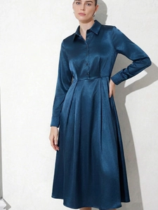 Elegant long-sleeved satin A-line dress in deep blue with shirt collar and pleated waist
